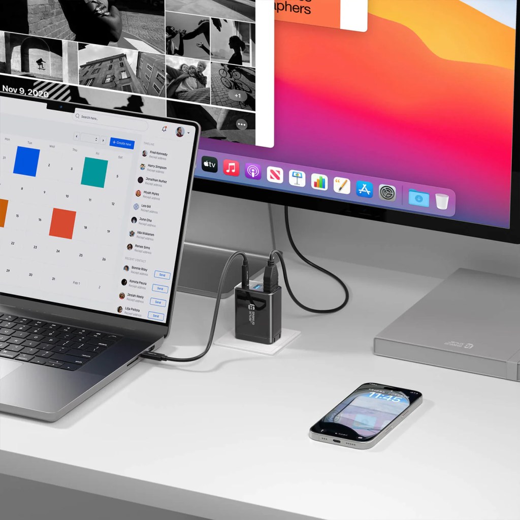 A laptop and a cell phone on a desk