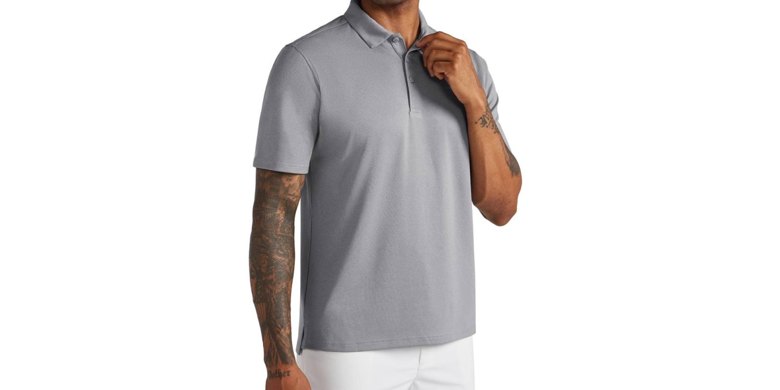 A man wearing a grey polo shirt