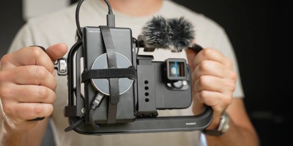 A person holding a video camera