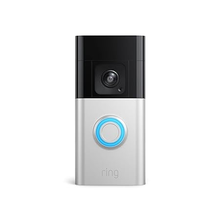 A black and silver device with a blue button