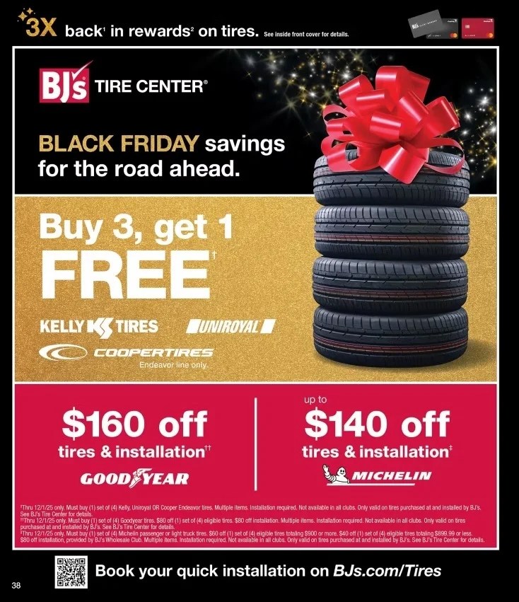 A black tire with a red bow