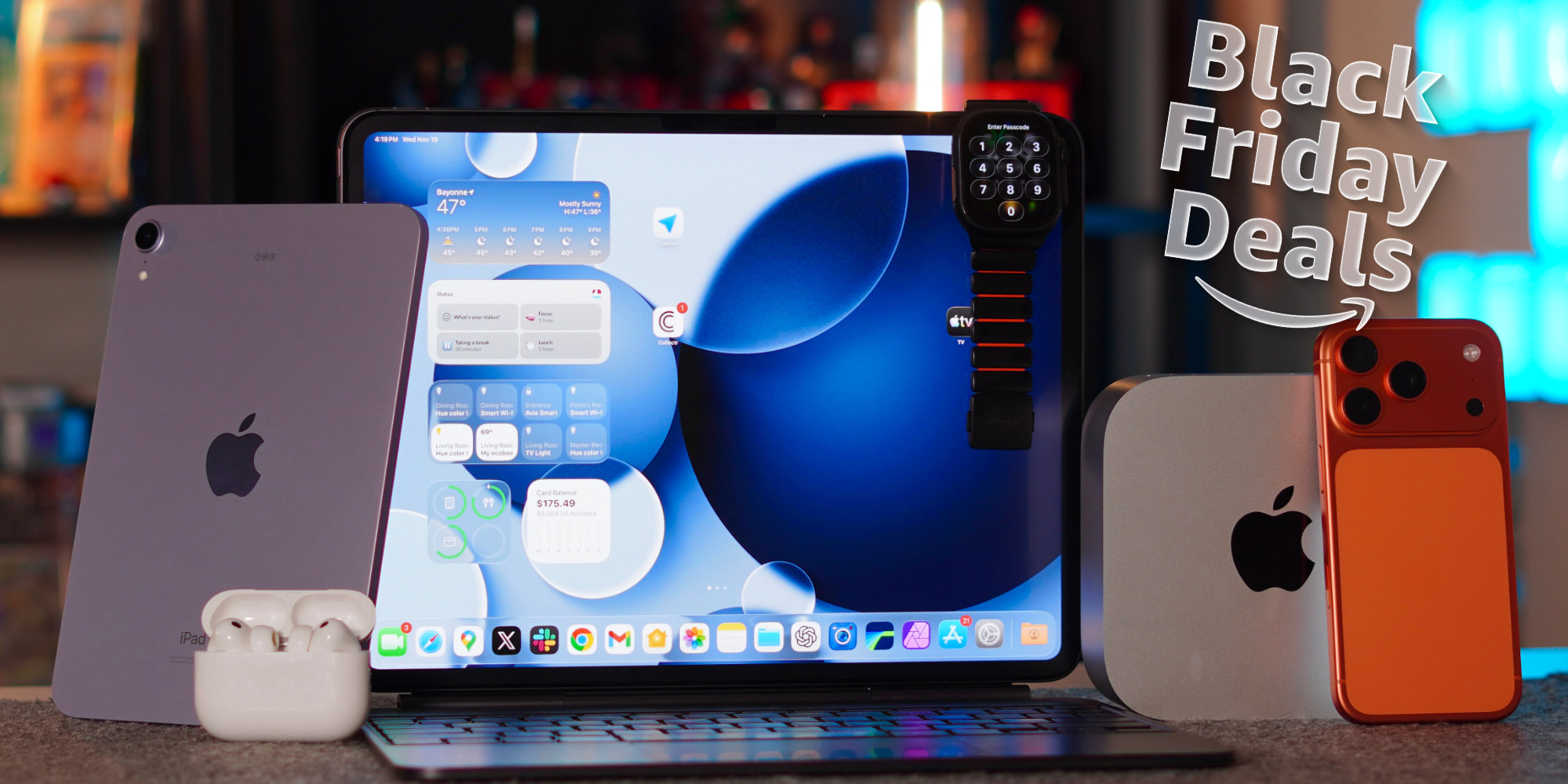 A laptop and speaker on a table