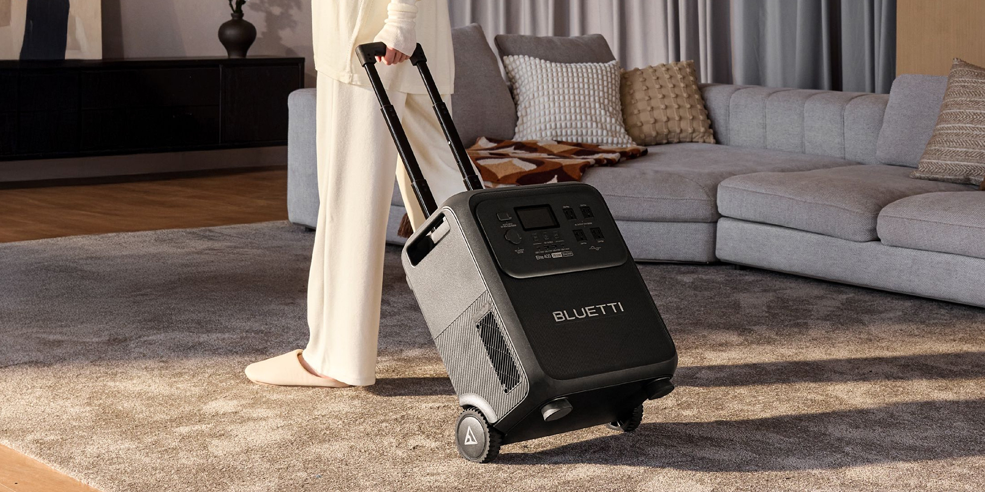 A person pushing a suitcase