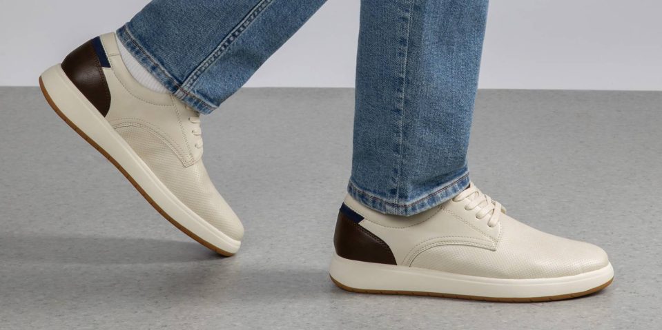 A person's legs and shoes