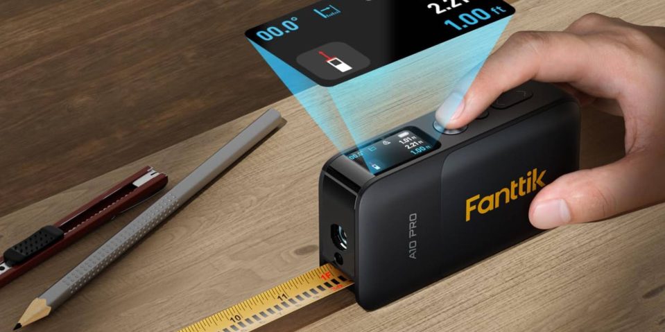 A hand using a measuring device