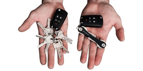 A person holding a bunch of keys