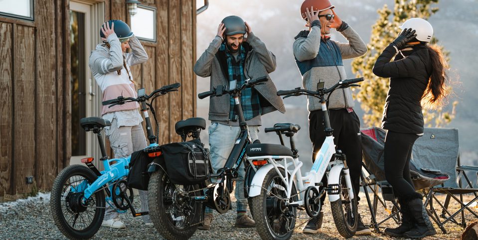 A group of people with helmets and bikes