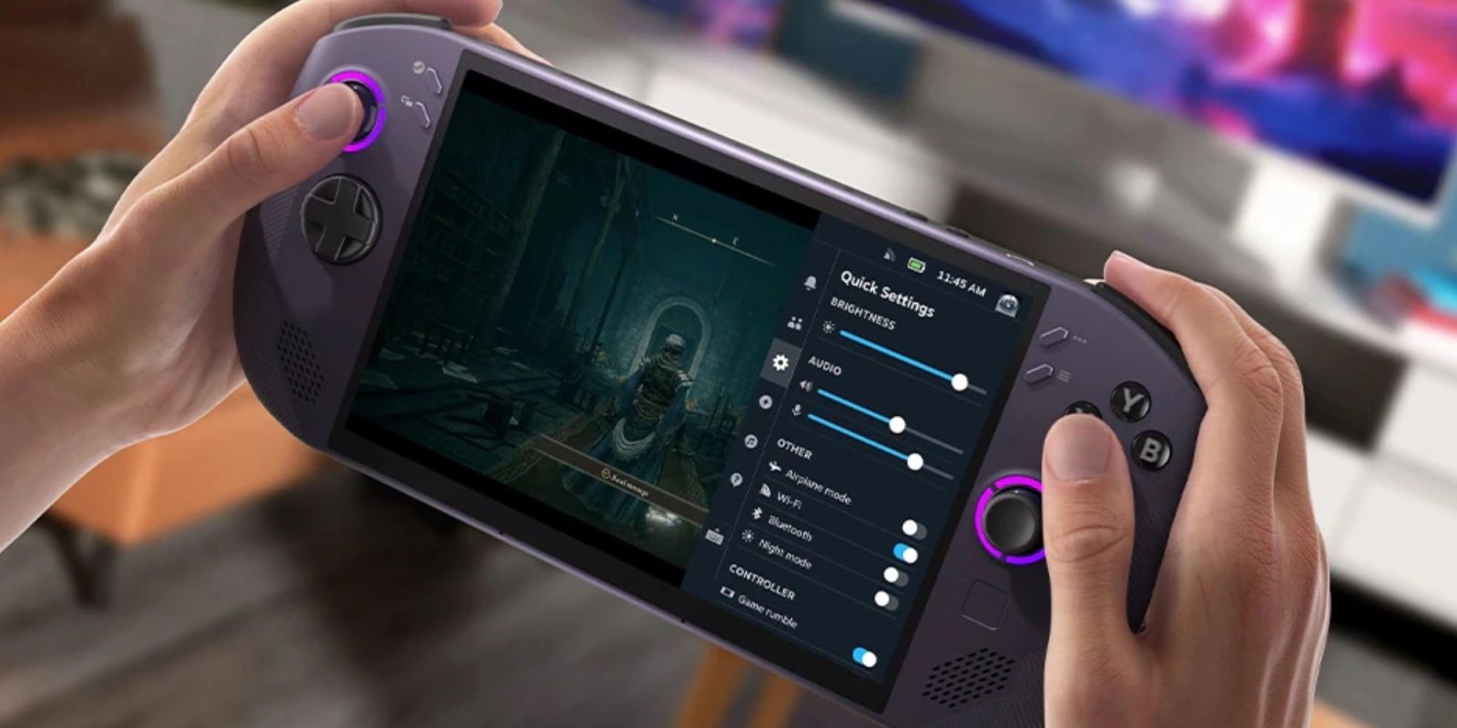 A hand holding a video game controller