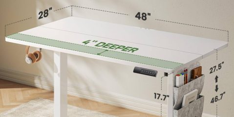 A white desk with green writing on it