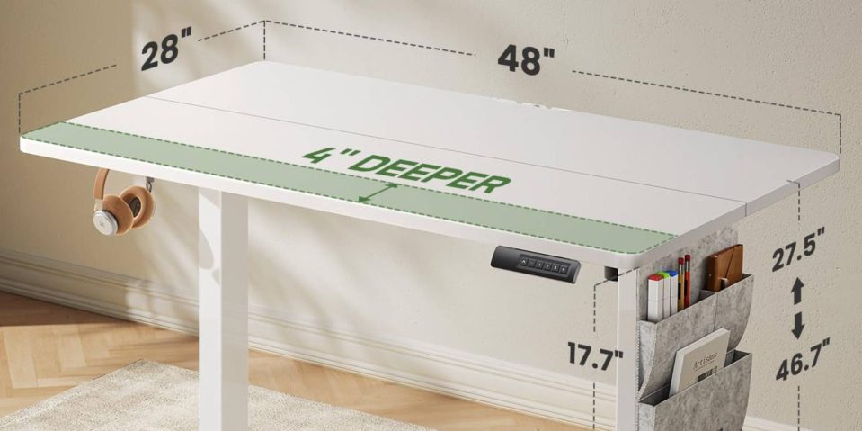 A white desk with green writing on it