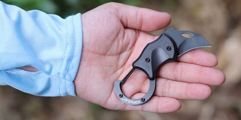 A hand holding a knife