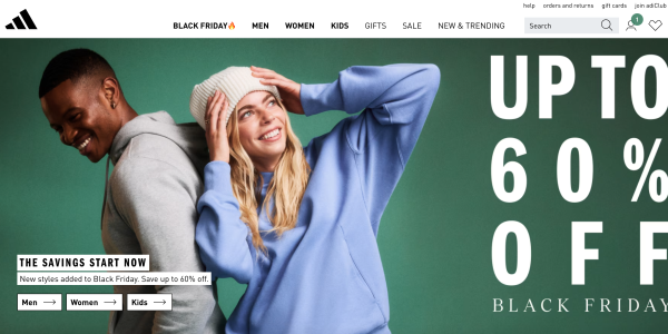 A woman smiling with a white hat on her head