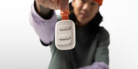 A person holding a remote control