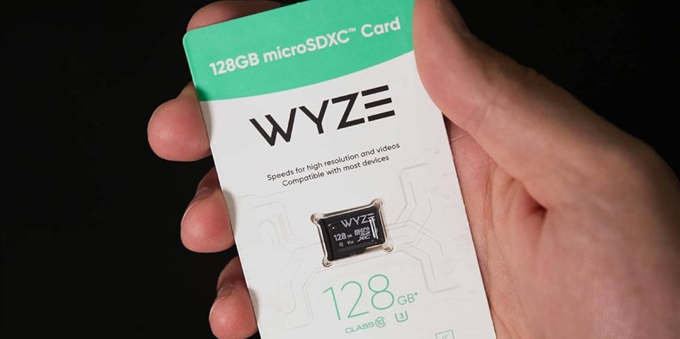 A hand holding a card