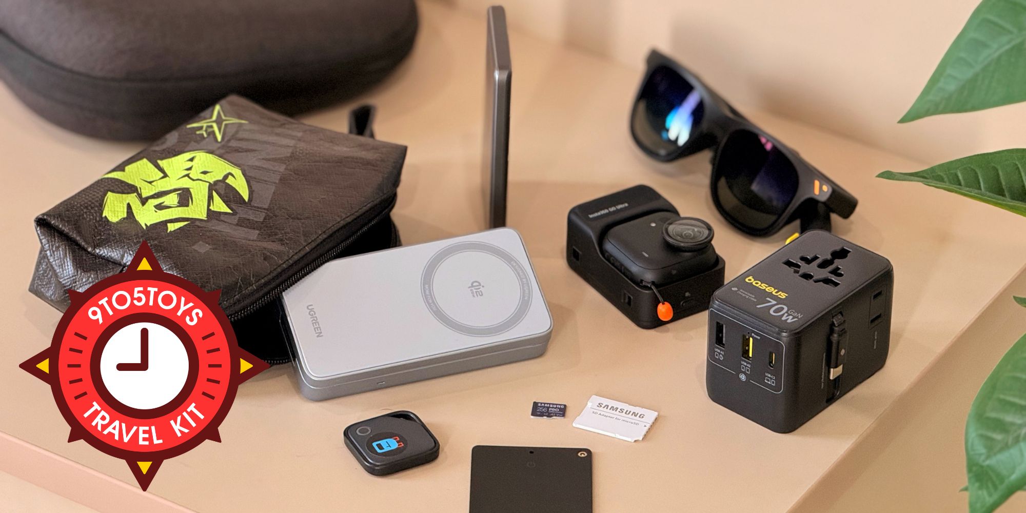 A group of electronic devices and sunglasses