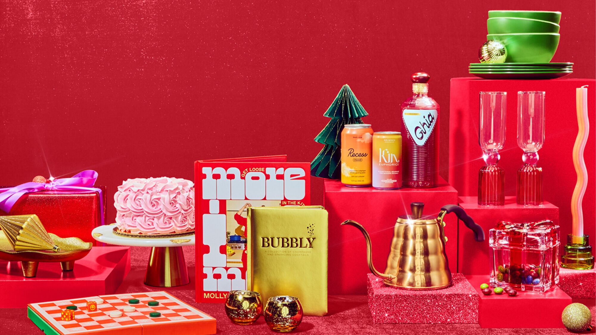 A table with a cake and drinks