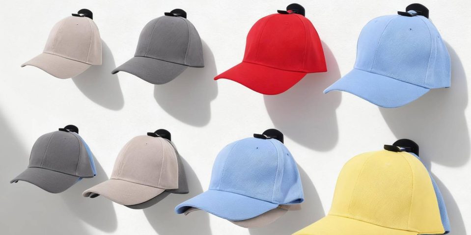 A group of hats on a wall