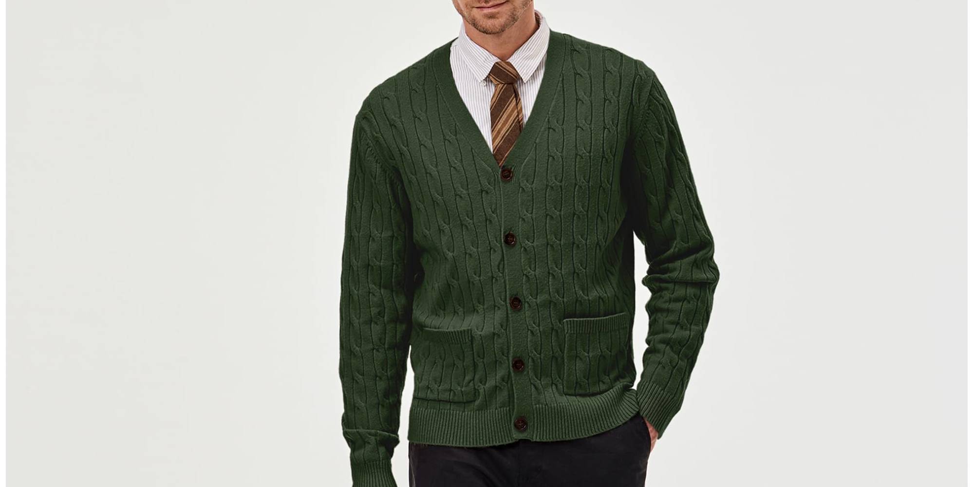 A man in a sweater and tie