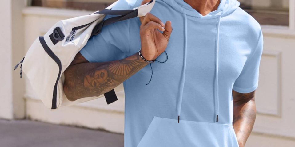 A person wearing a light blue hoodie