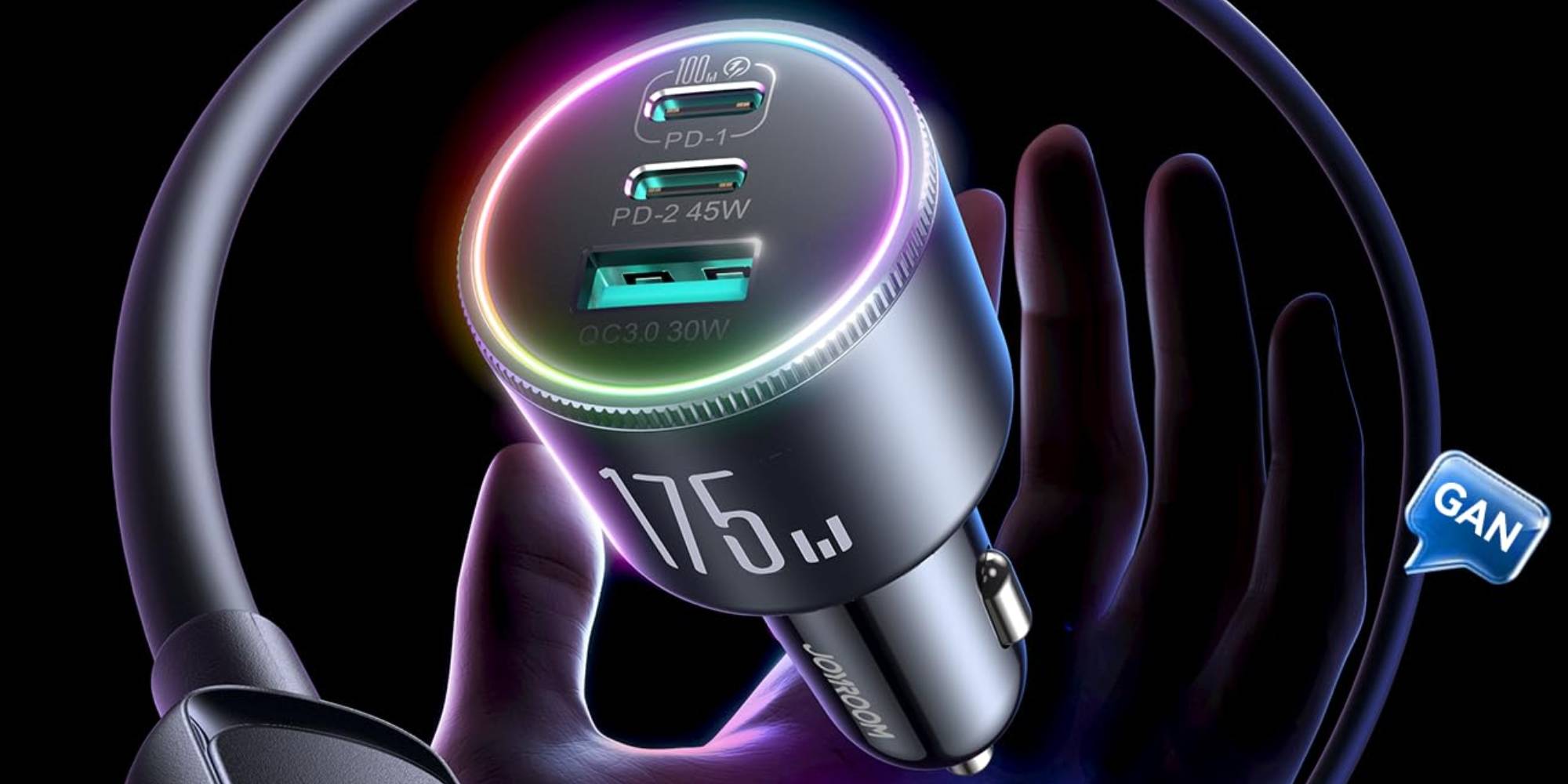 A hand holding a car charger