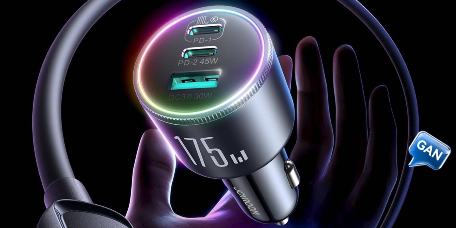 A hand holding a car charger