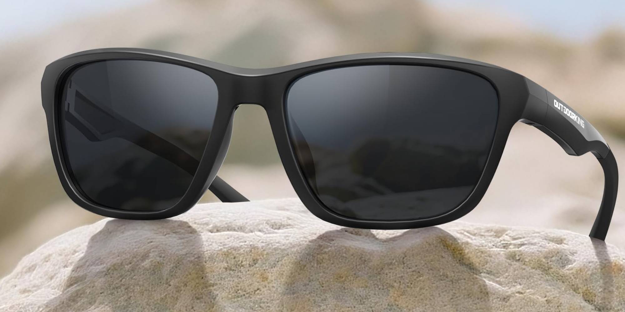 A pair of sunglasses on a rock