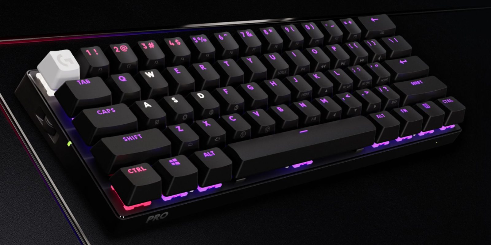 A black keyboard with purple lights