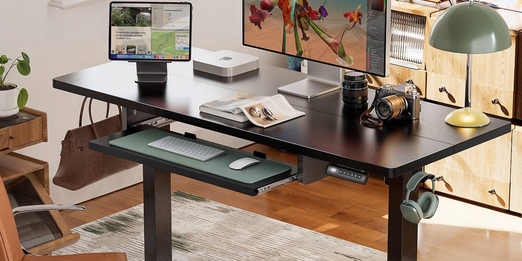 A desk with a computer and a monitor