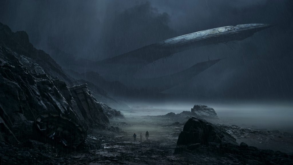 A group of people standing in a rocky area with a spaceship in the background