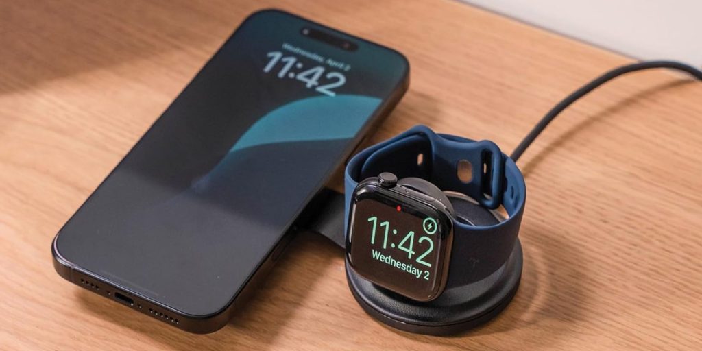 A smart watch charging on a wireless charger