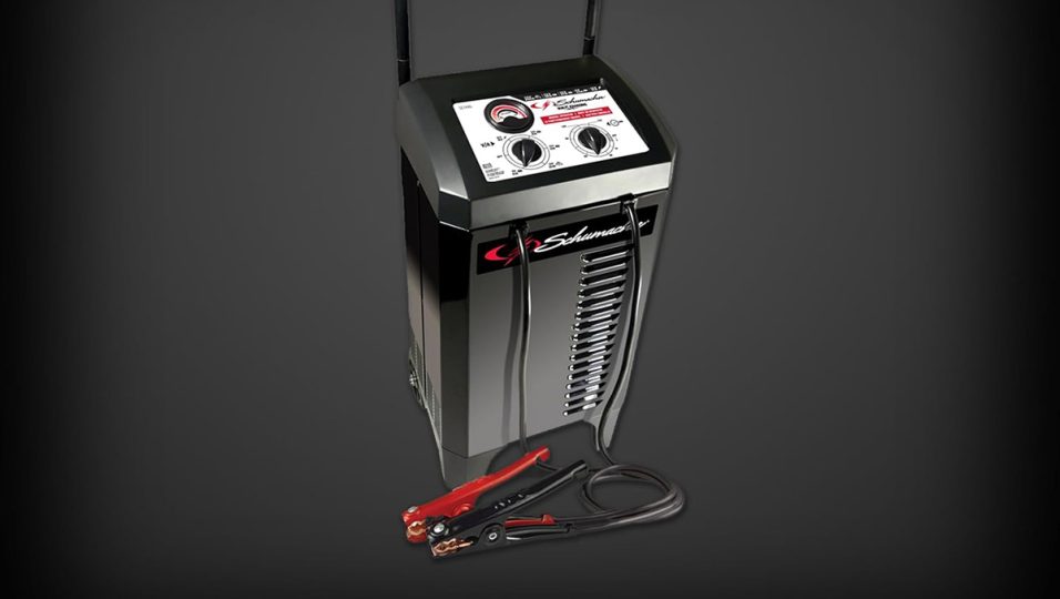 A black and silver battery charger