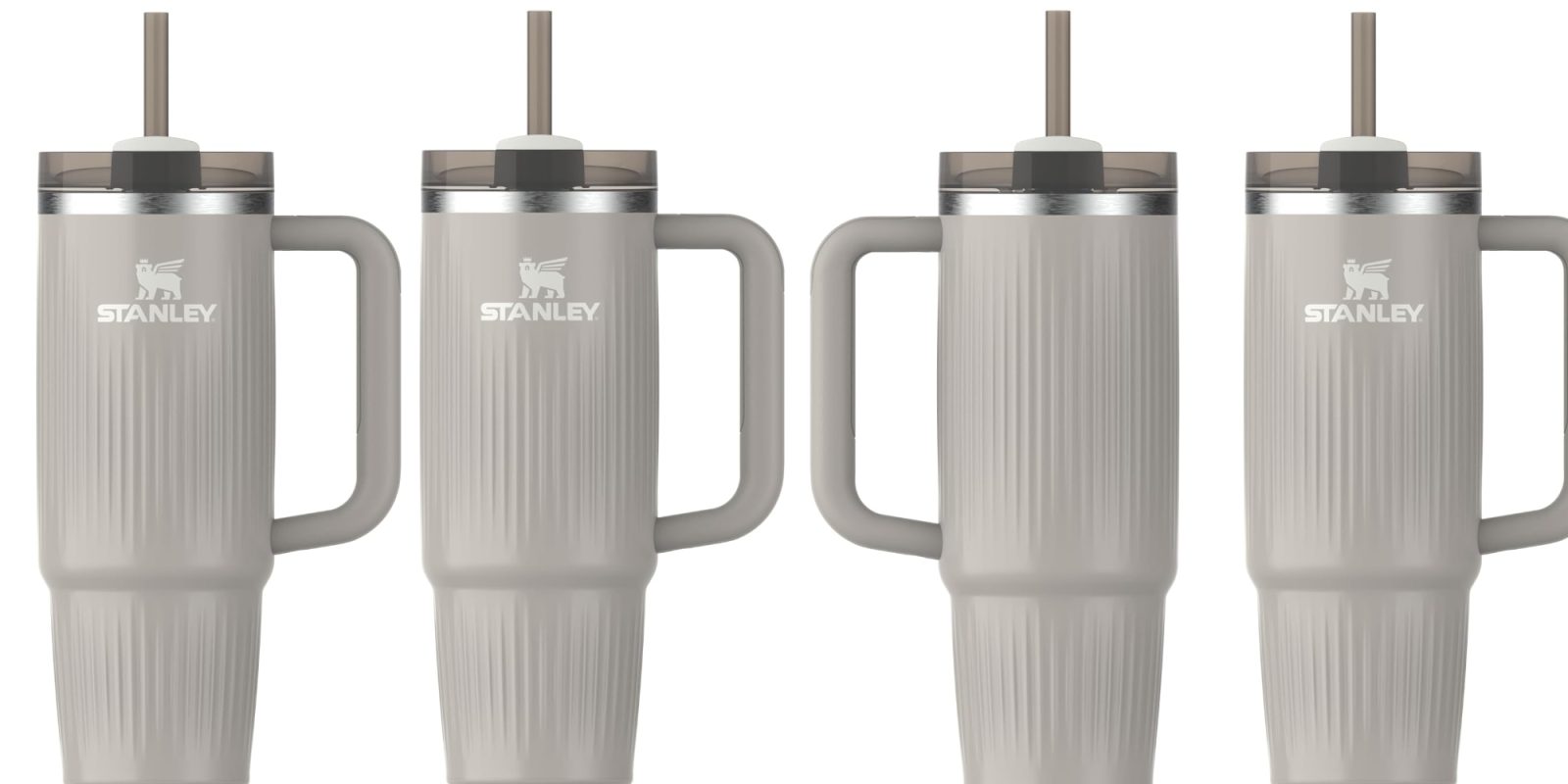 A couple of white cups with straws