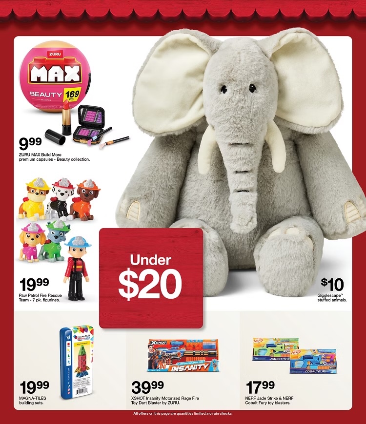 A stuffed elephant toy and other toys