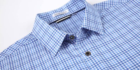 A close up of a blue and white checkered shirt