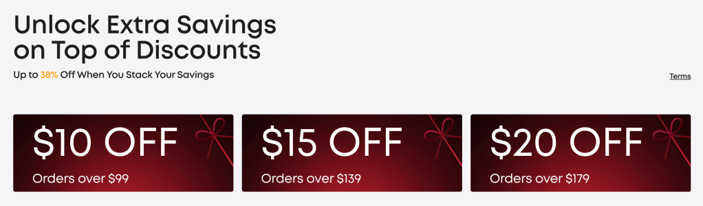 A red and white gift card with text and a bow