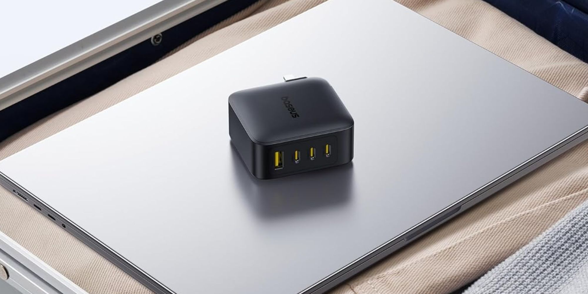 Image showing Baseu's 4-port 140W laptop GaN charger in black.