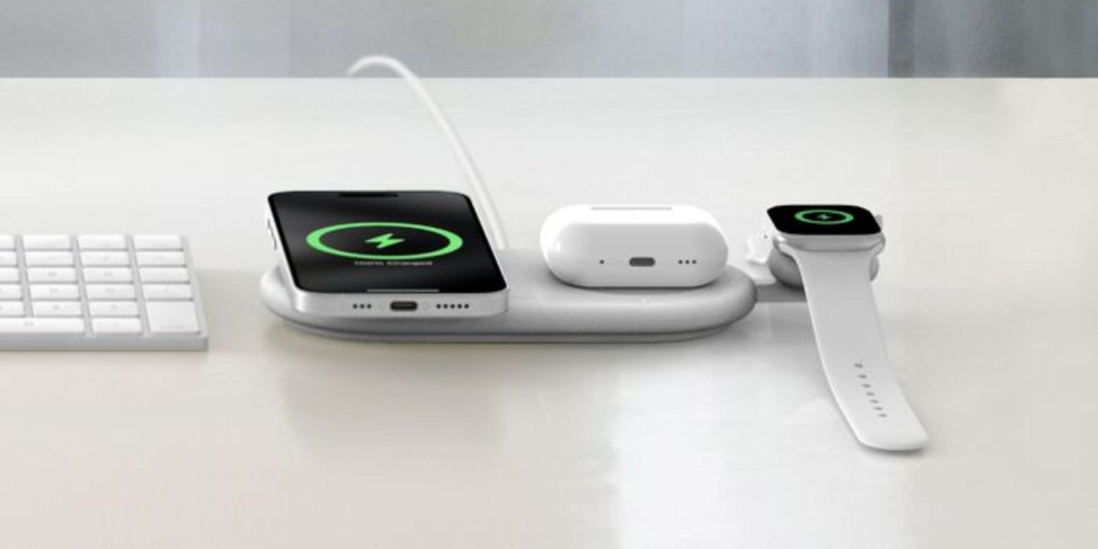 A phone and a charger on a white surface