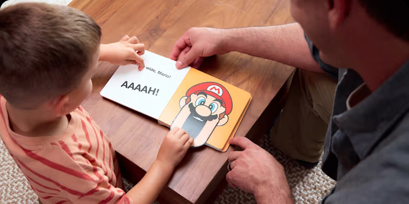 A man and a child reading a book