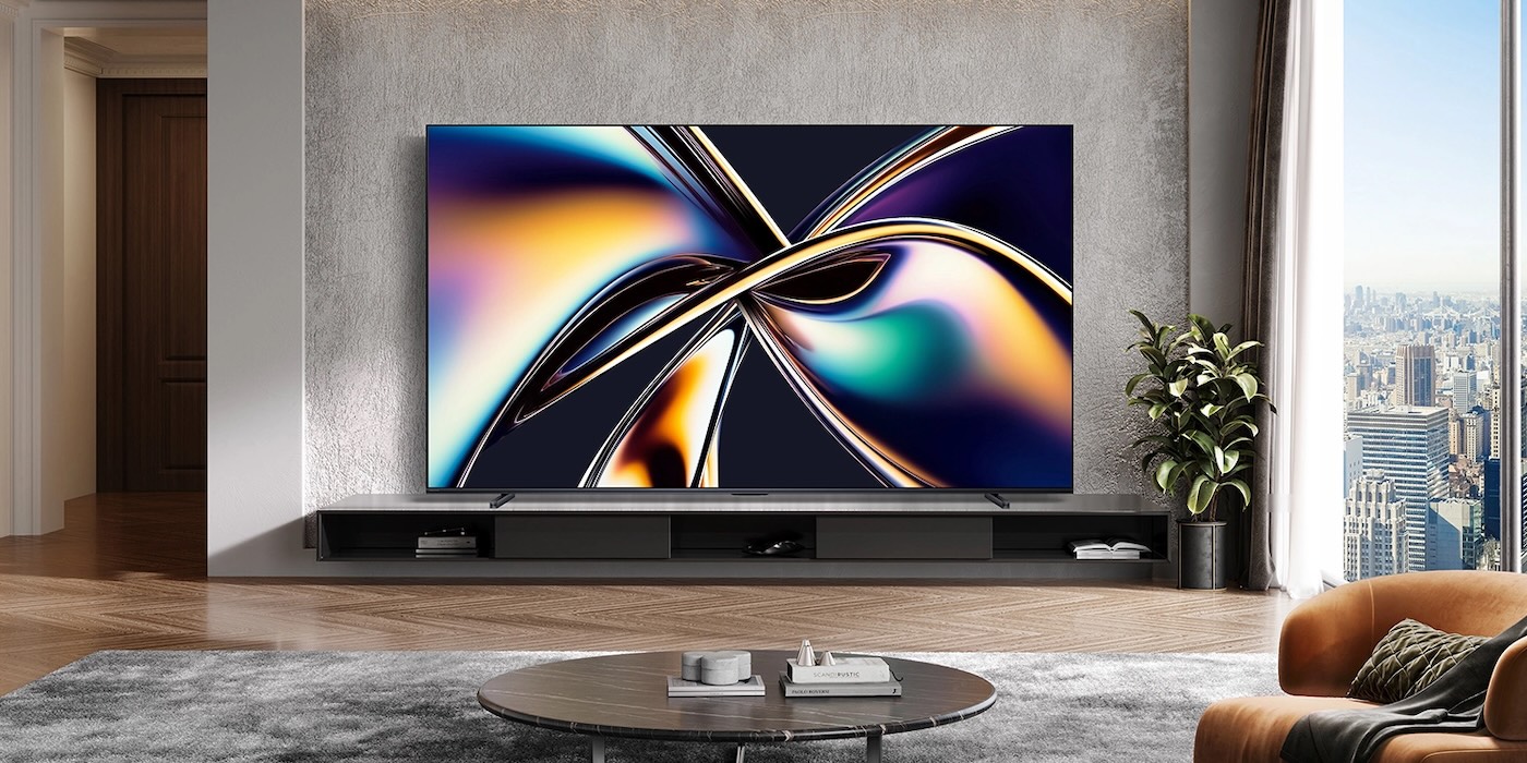 A tv on a shelf in a room