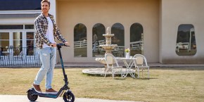 A man riding a scooter