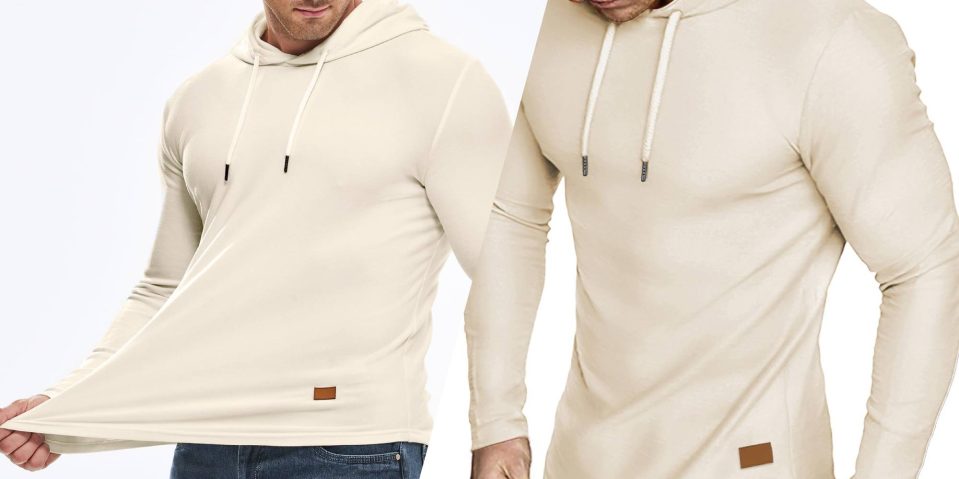 A man wearing a white hoodie