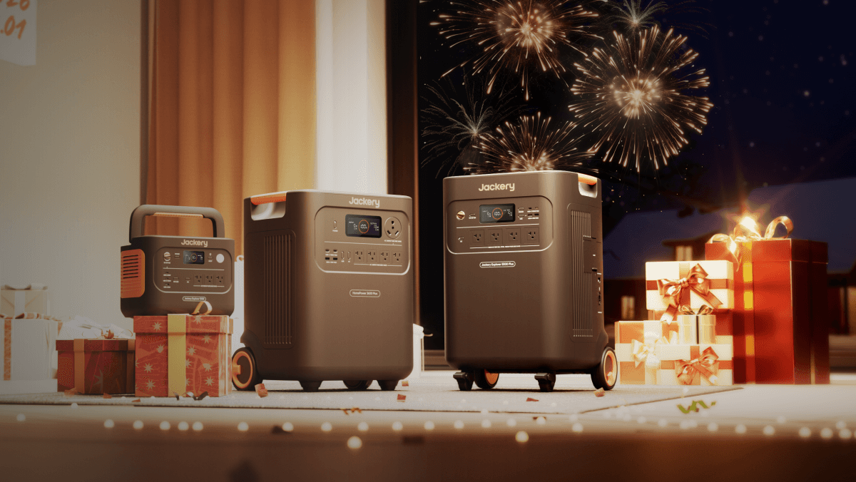 A group of luggage boxes with fireworks in the background