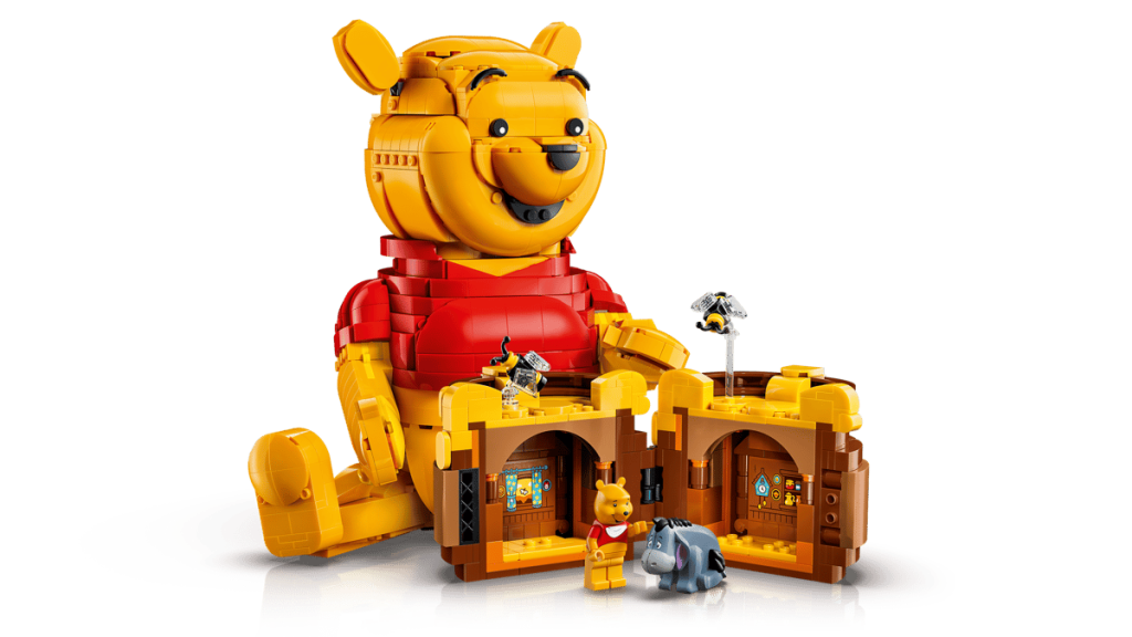 A toy bear with a building set