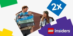 A man and girl holding boxes