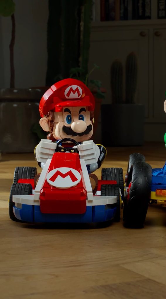 A toy car with a man in a red hat