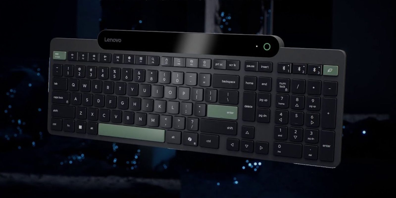 A black keyboard with a green light