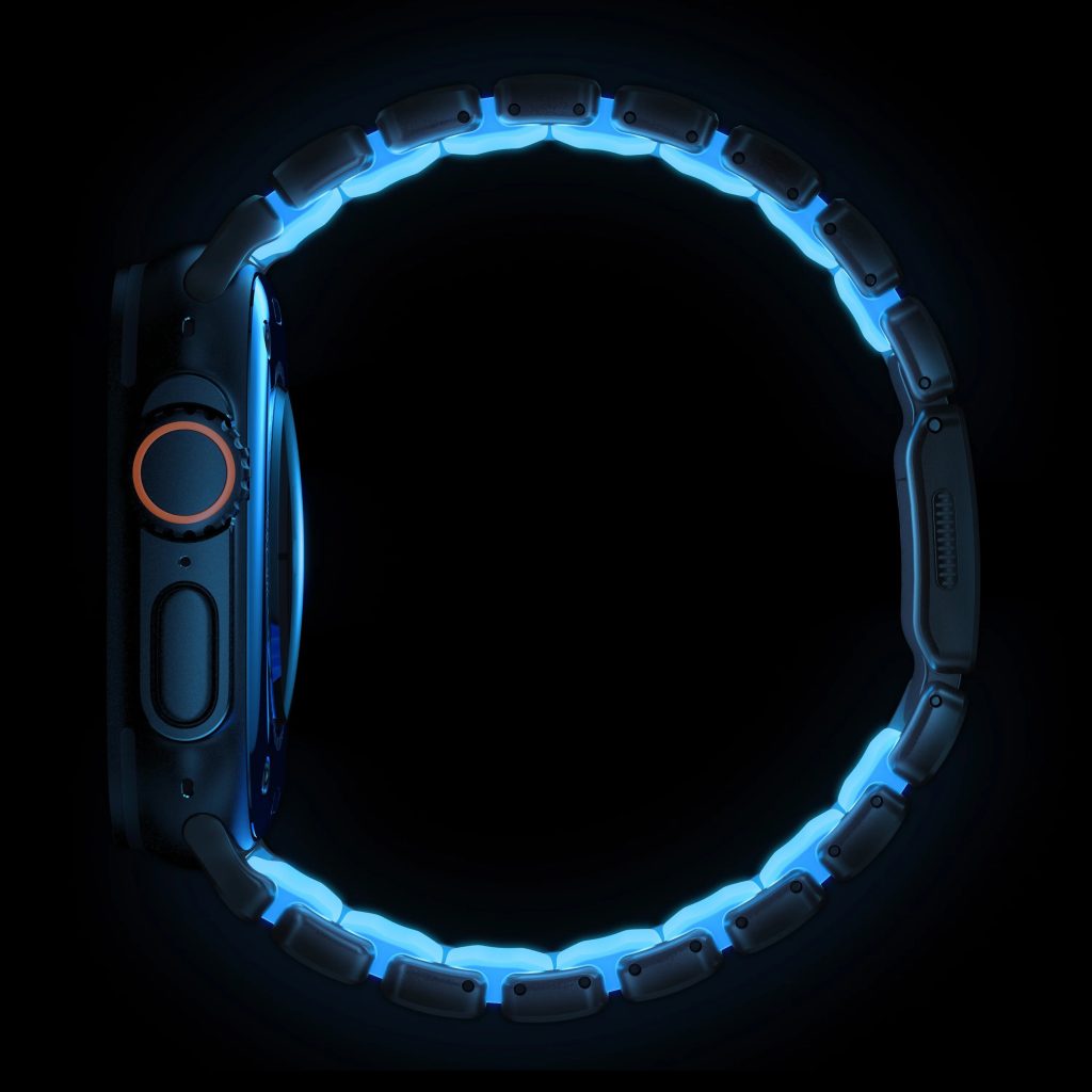 A black and blue watch with blue lights