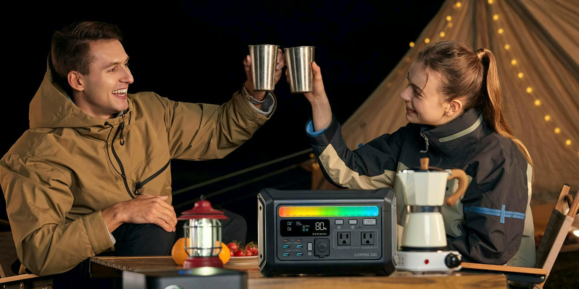 A man and woman holding cups