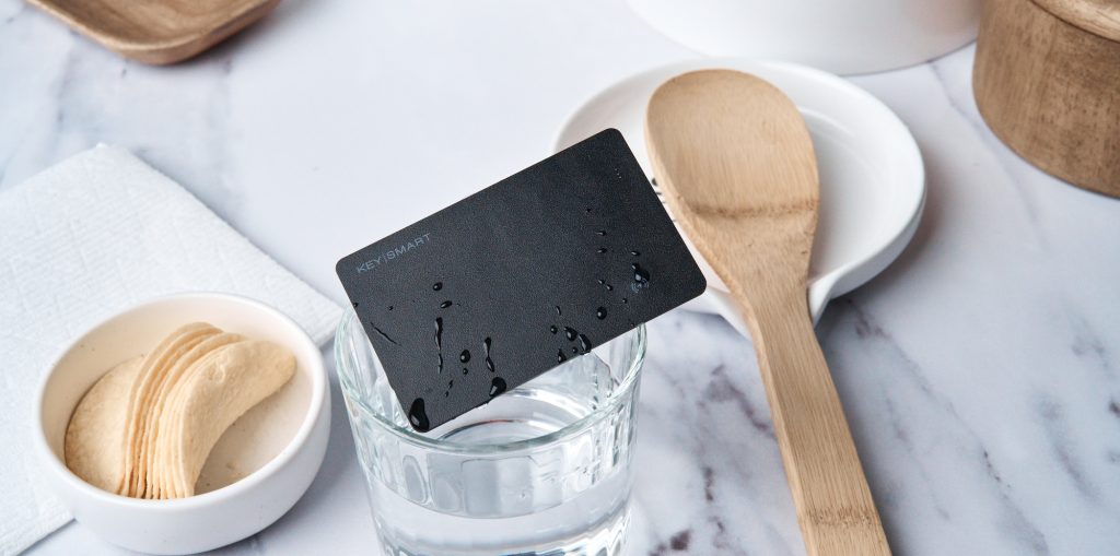 A card on top of a glass of water