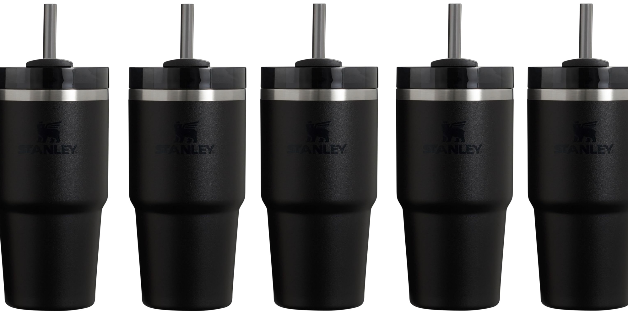 A group of black tumblers with straws